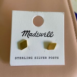 Gold stud earrings
